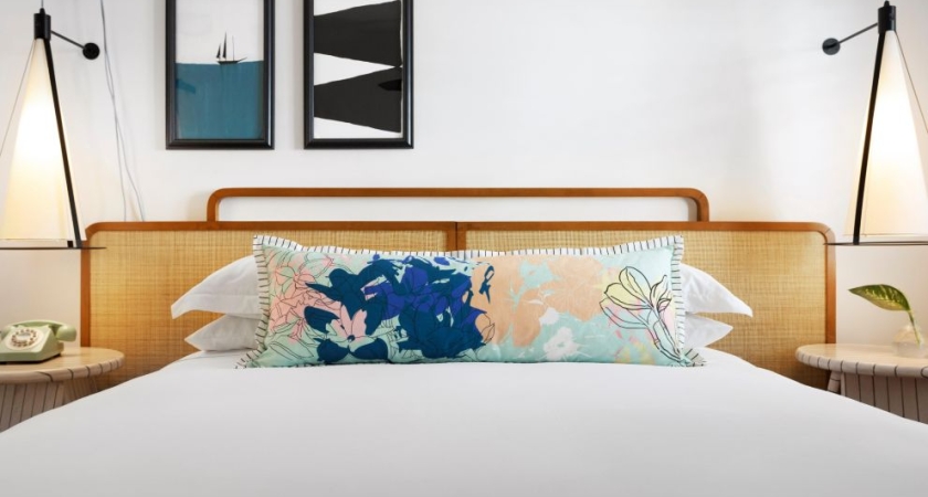 king bed with decorative pillow