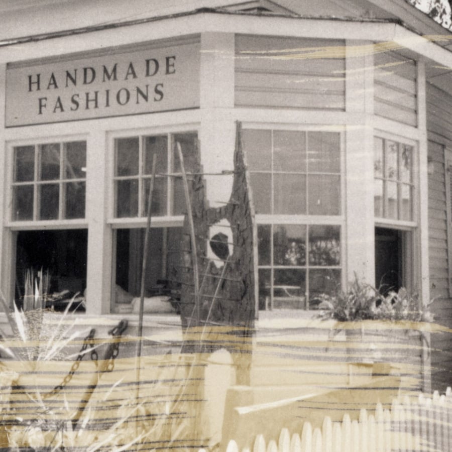 A historical photo of Isabel's Fashions storefront window